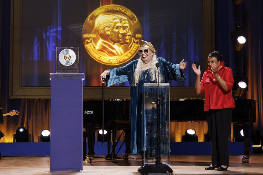 Joni Mitchell accepts the 2023 Gershwin Prize for Popular Song from Librarian of Congress Carla Hayden