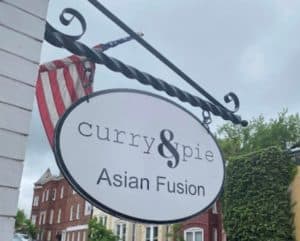Sign outside Curry & Pie in DC