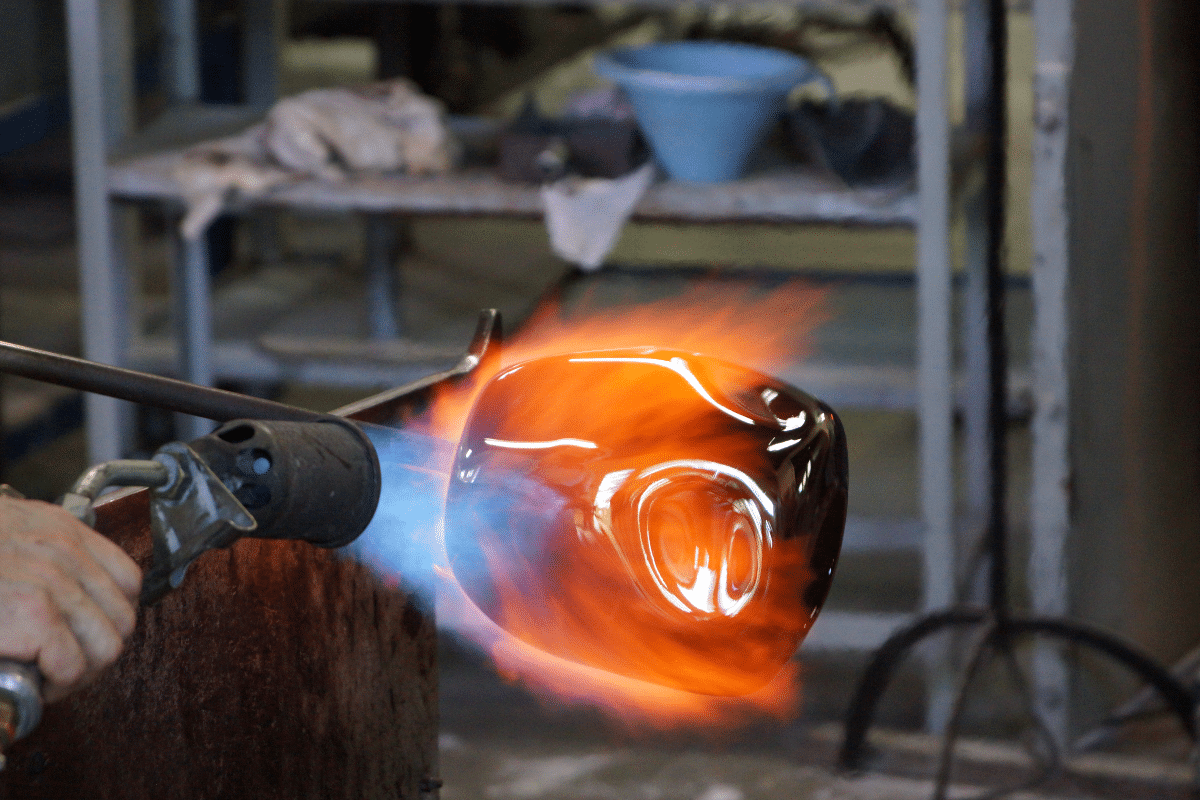 glass being blown by hand